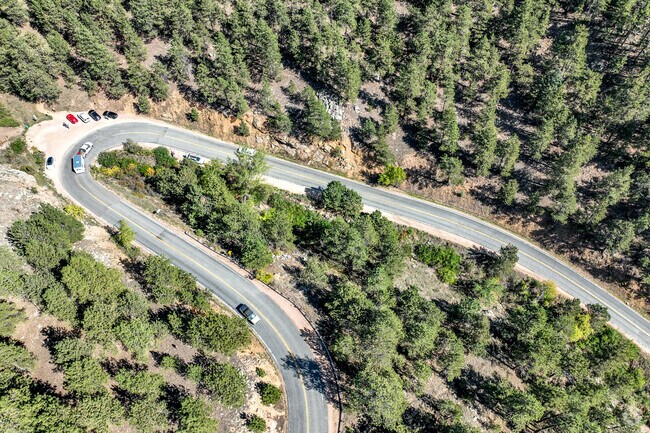 Sunshine Canyon Drive is the neighborhood’s main thoroughfare, winding through the terrain.