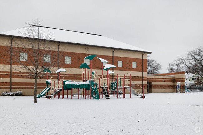 Andrew J. Rickoff School's outdoor playground beckons with colorful equipment.