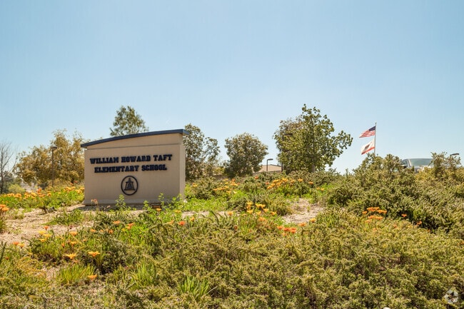 Spring Flowers in Bloom Around Landscape at Taft Elementary School in Mission Grove