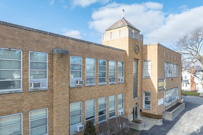 The entrance to Montini Catholic School welcomes all through its doors.