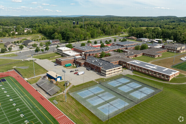 Pine Bush High School students can play on the varsity tennis team.