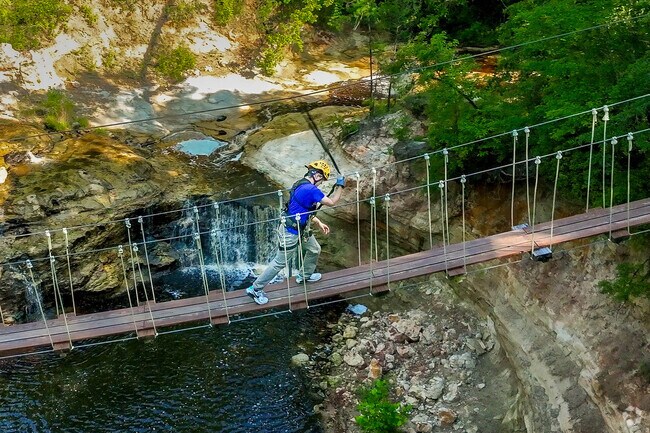 There are several rope bridges to cross while on the course at ZipQuest in Kings Grant.