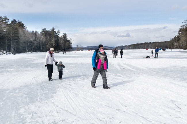 A family enjoys a winter day in Bridgton.