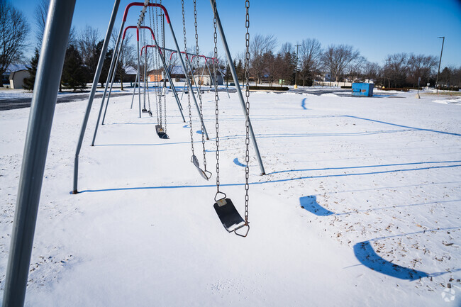 The swings are ready for kids at Coy Elementary.