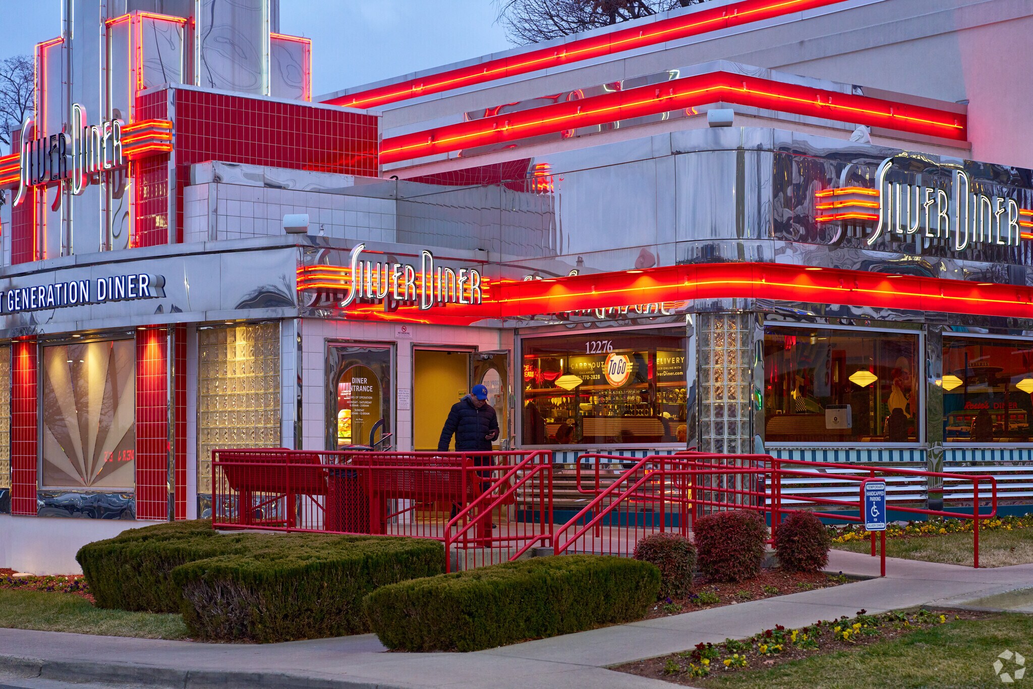 A Redland resident picks up food from Silver Diner.