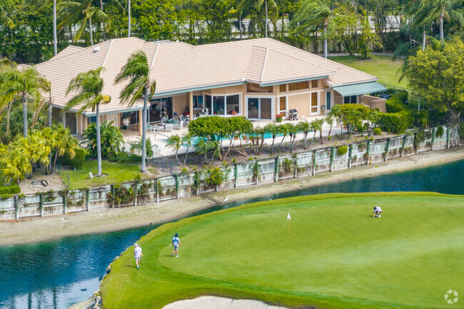 Many of the homes in The Hamlet overlook look the beautiful golf course and its lakes.