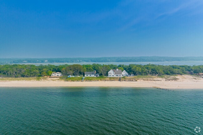 Residents of Nissequogue enjoy picturesque views of the beach along the waterline.