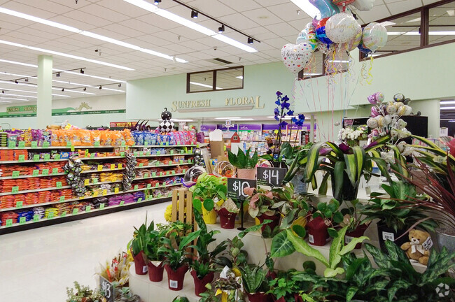 Solve all of your grocery needs at Sun Fresh Market near the Rainbow neighborhood.