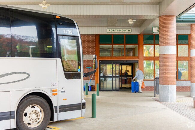 COAST bus stop offers service to Portsmouth and nearby towns.