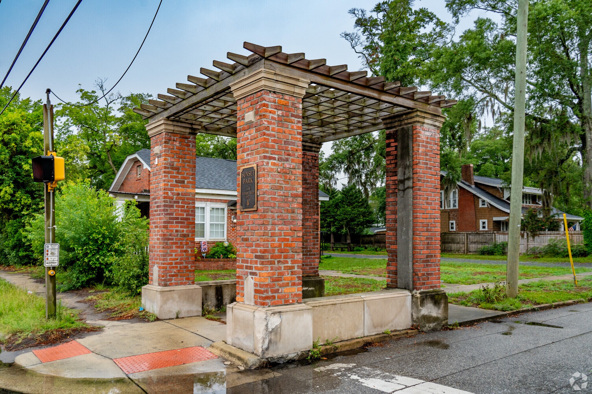 Brick pergolas flank the entrance to Sunset Park.