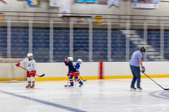 Residents of Mueller Park love watching their kids play hockey at the Civic Center.