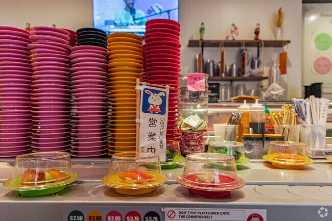 Watami Sushi offers rotating plates and a fun atmosphere, in Seven Hills.