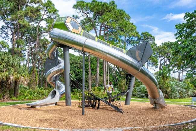Barwick Park has a futuristic stainless steel slide and a playground in Polo Trace.