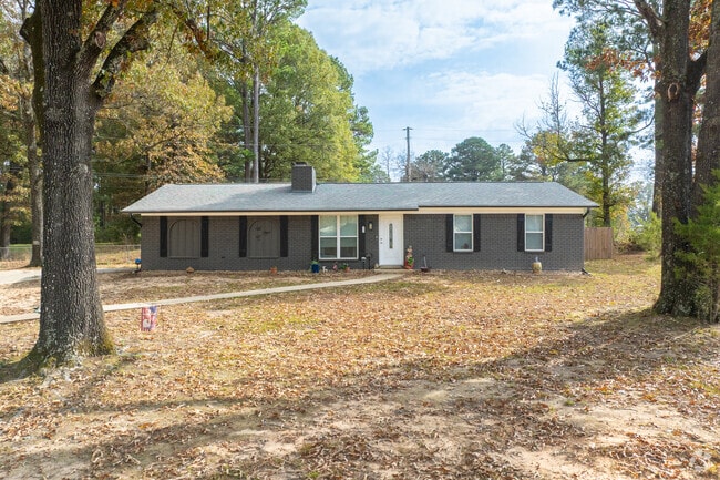 Tall trees provide ample shade to many of the homes in Nash.