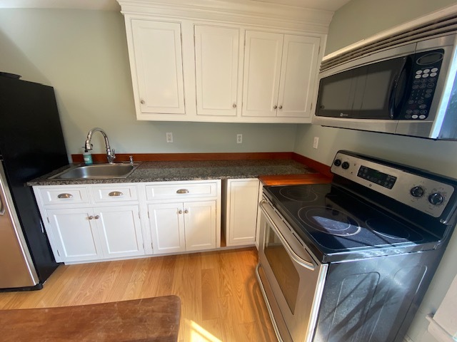 updated cabinets and appliances