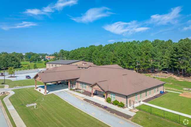 low altitude aerial shot of the front of the school