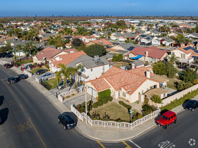 Looking East from the late 20th century homes of East Delano towards the farmland beyond.