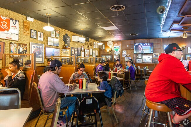People flock to Matt's Bar for the food and cozy, friendly atmosphere in Powderhorn Park.