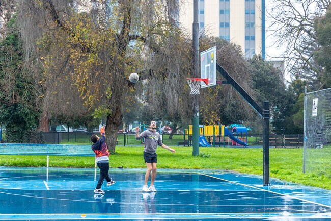 Play a round of basketball with your friend Mosswood Park near the Pill Hill neighborhood.