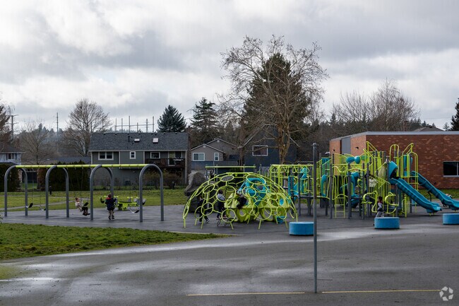 Several large play structures are featured at Hollydale Elementary School.