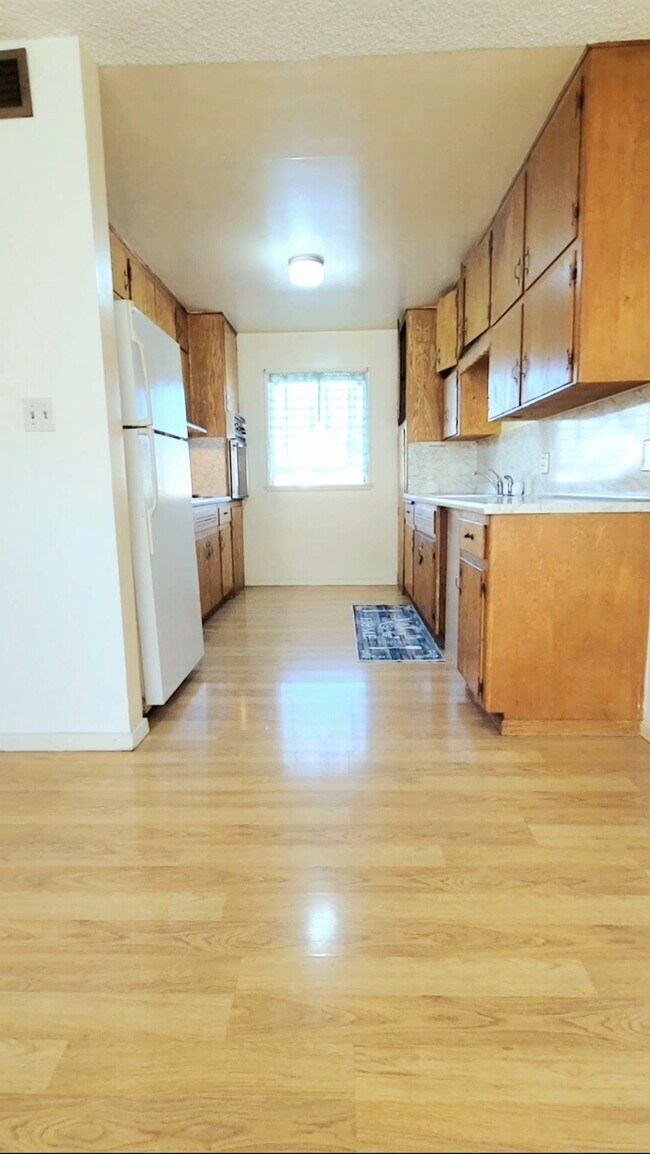 Full kitchen has stove and oven