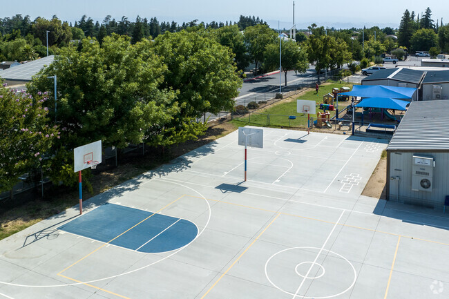 Clovis students learn teamwork by playing basketball at Charlie Keyan Armenian Community School.