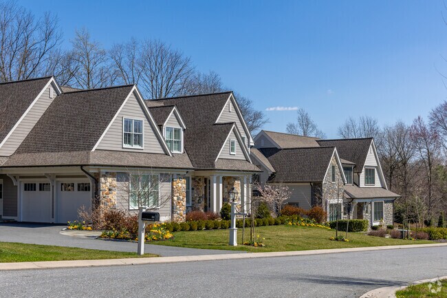 New build homes in Greenville stick with typical construction materials for the area like stone.