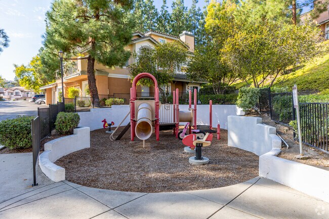 Tivoli Park Row features a small playground for kids to enjoy.