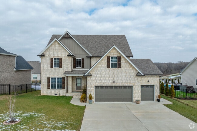 Homes can vary in size and material such as white brick Craftsman in La Vergne.