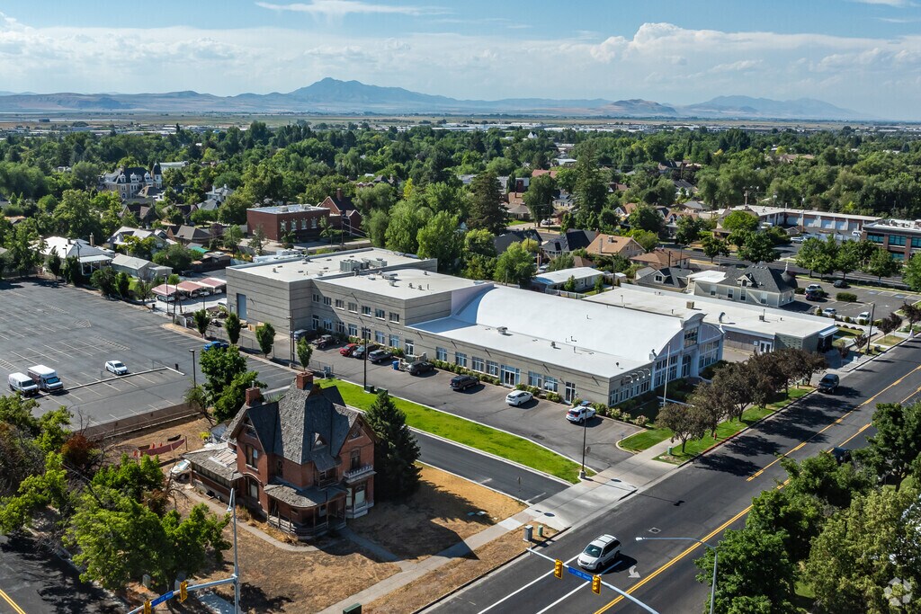 Young Mother Program Logan is located in a neighborhood with many mature trees.