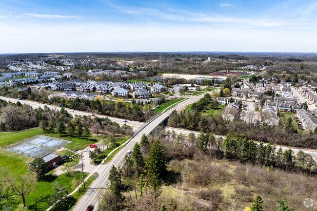 A walkable bridge carries residents across I-94.