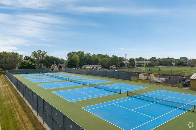 John F Kennedy High School has a large set of tennis courts.