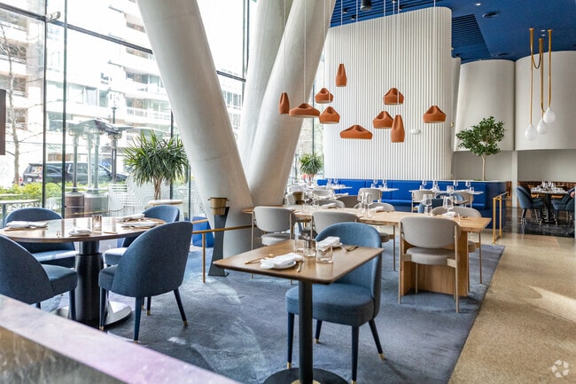The dining area at Imperfecto in West End offers a sleek aesthetic.