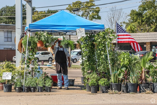 Local vendors set up along Ferguson Road for daily sales in Casa View.