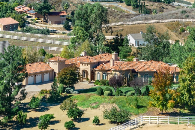 Spanish-style home built on a large lot in La Cresta.