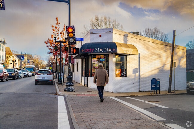 Locals walk through Magoun and can enjoy various eateries such as Tasty MoMo.