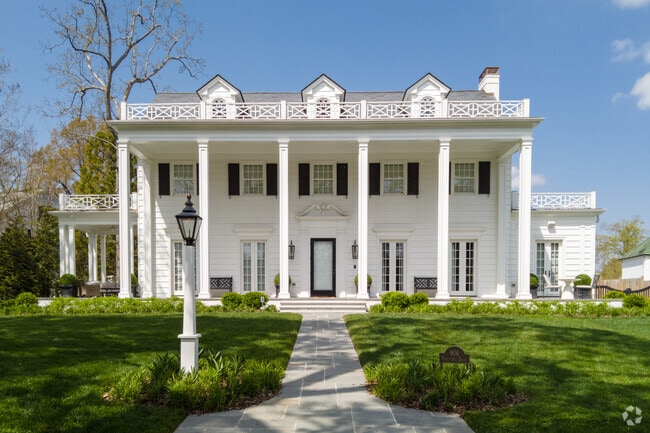 Greek Revival homes in Greater High Point feature columns and symmetrical facades.