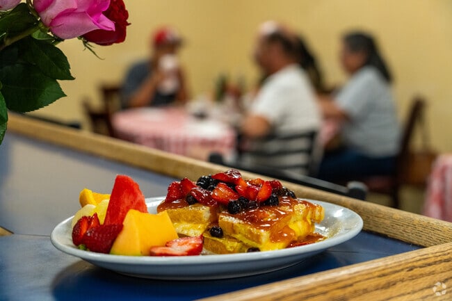 French toast topped with berries shines at Sunrise Cafe near Lake of the Pines.