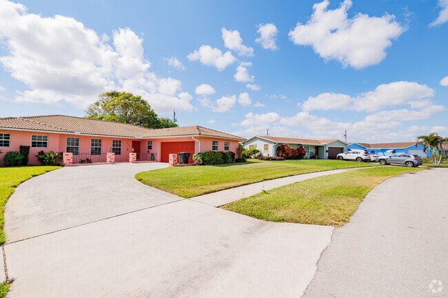 Classic ranch-style homes nestled in the serene neighborhood of Roosevelt Estates.