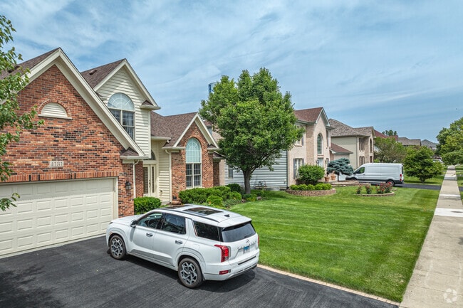 Homes in Crestview Knolls feature well manicured lawns and oval walkways.