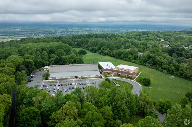 Under changing skies, Thomas B. Conley Elementary School in Bethlehem, NJ remains a steady presence in the lives of local families.