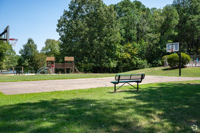 Locals have a basketball court and playground at Five Oaks in Patterson Place.