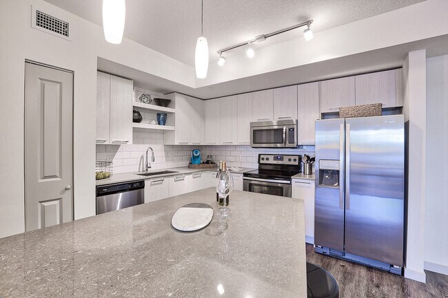 Gourmet Kitchens feature Stainless Steel Appliances.