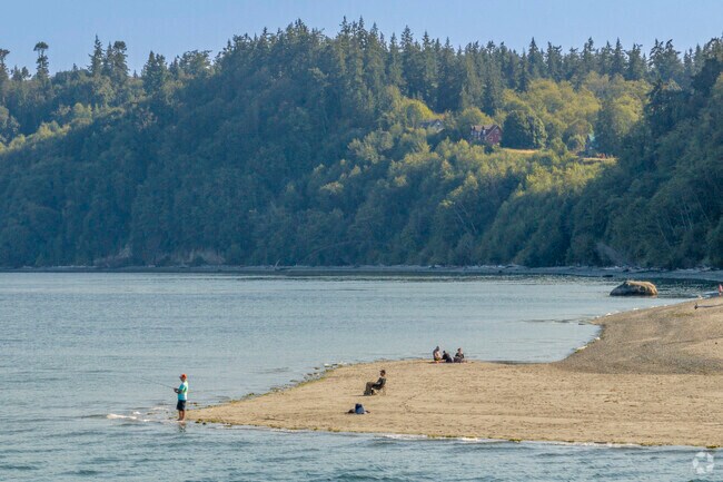 Fishermen take to the water from Point No Point Lighthouse in Hansville, Washington.