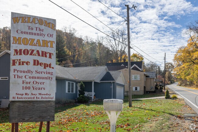 A colorful welcome sign marks the entrance to Mozart.