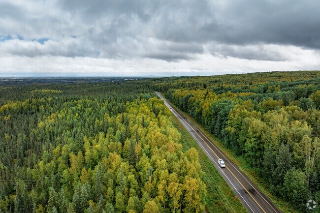 Residents enjoy the private wooded lifestyle in Farmers Loop.
