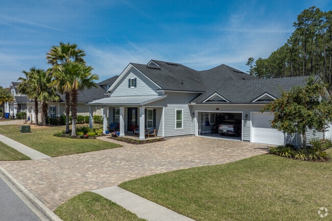 Single story homes boast large garages in Cimarróne.