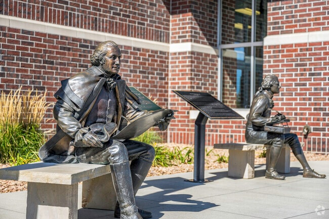 You will find a statue of George Washington outside a boot store in Willow Park.