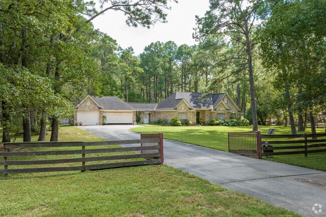 Setback homesteads on acreage are typical in Liverpool.