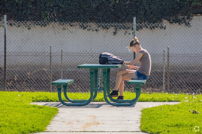 Sit back and read a book at Bouton Creek Park.